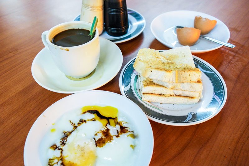 local singapore food kaya toast and soft boiled eggs