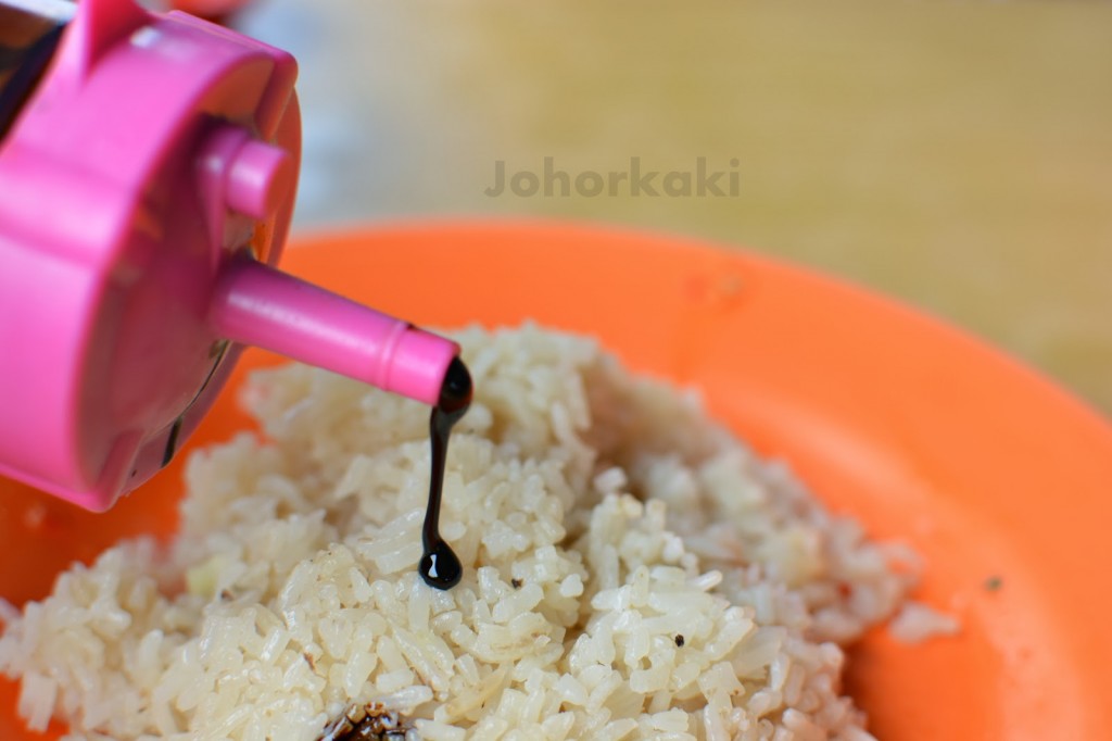 chicken rice with dark sauce