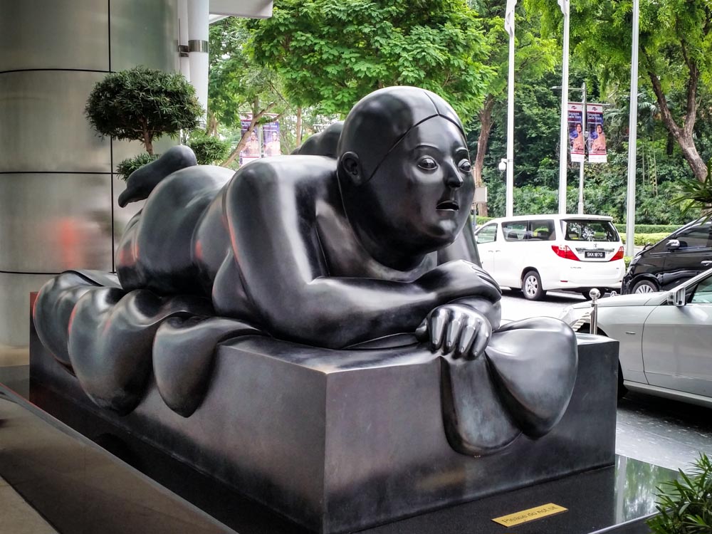 st regis singapore li chen statue lying