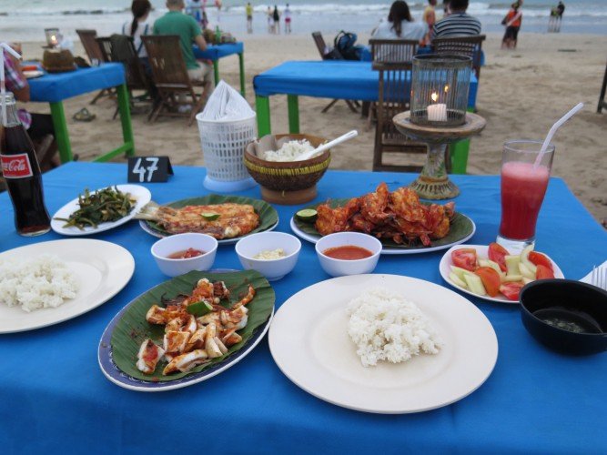 must eat in bali Dinner on Jimbaran Beach Bali