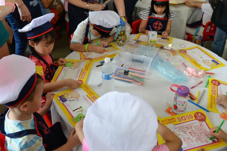 Little Chefs writing wishes and hopes for the future of singapore