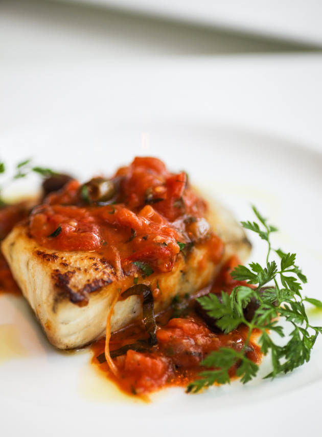 Zafferno - Oven-baked Seabass with tomatoes, olives, capers and fresh herbs