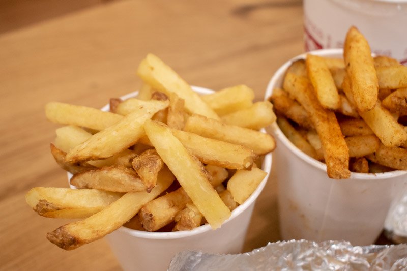 Close up of Five Guys Fries and Cajun Style fries