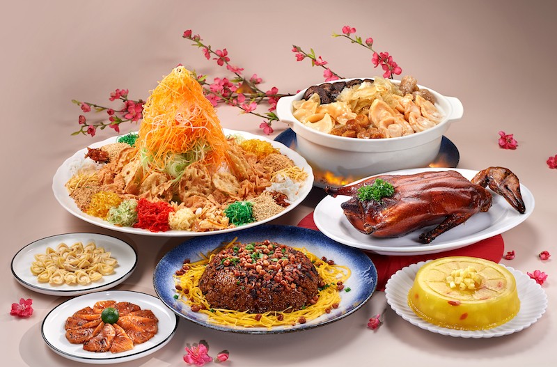 Six dishes from peach garden's Chinese new year menu including Peking duck and yu Sheng