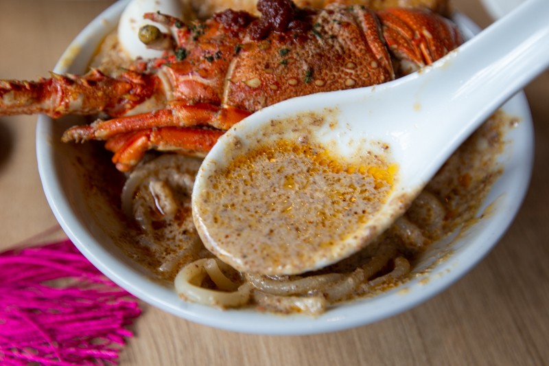 Spoonful of laksa gravy from Lime Restaurant Parkroyal Collection Pickering 17