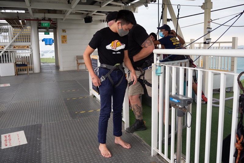 Strapping on the harness at AJ Hackett Sentosa