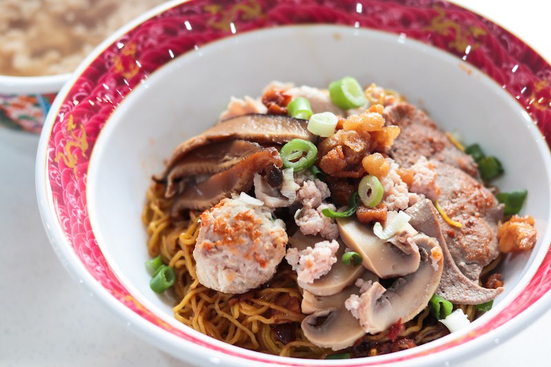 A bowl of mala spicy pork noodles
