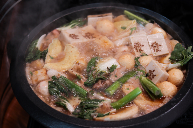 A stonepot full of steamboat ingredients from Feima Taiwan Stone Hotpot
