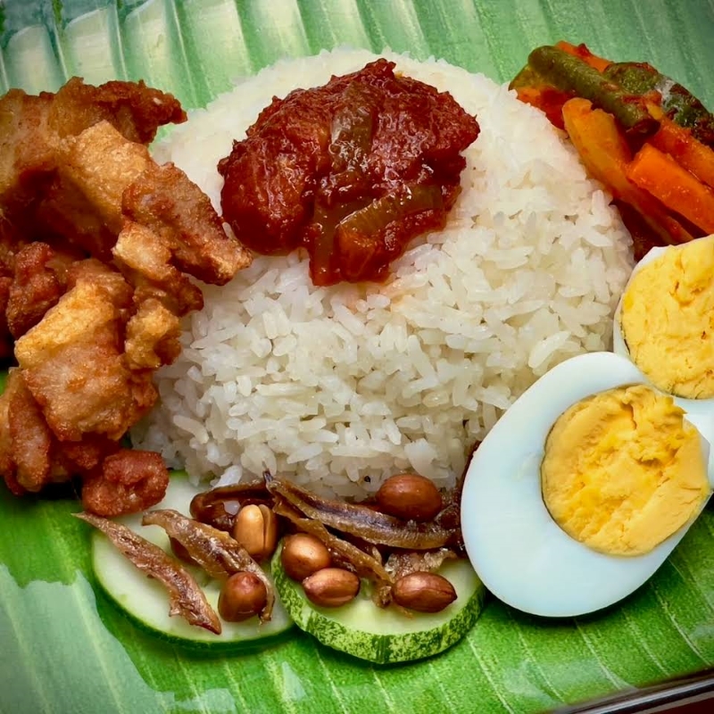 Image of nasi lemak with Fried Pork belly