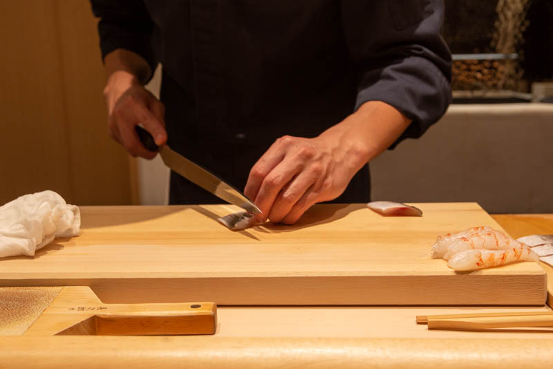 Chef Kuroki slicing fish