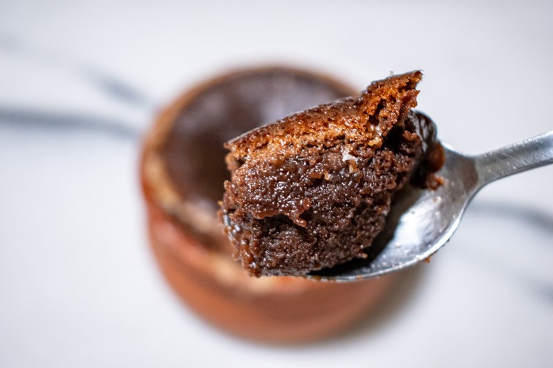 A scoop of the 2-ingredient Chocolate Soufflé Cake