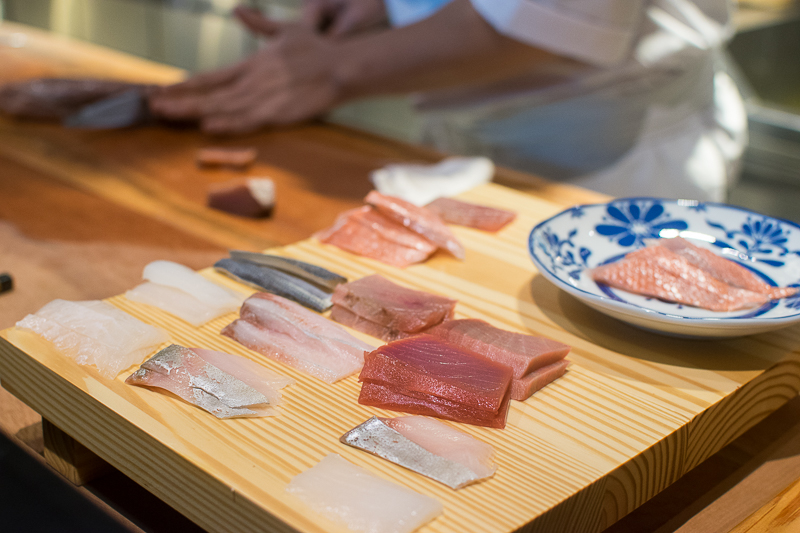 A chef preparing sashimi
