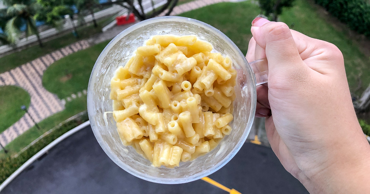 A top down shot of Mac & Cheese in a mug