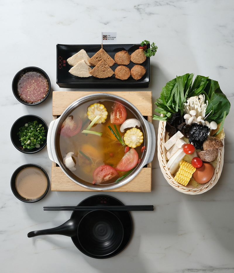 Flatlay of plant-based hotpot dishes