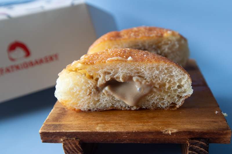Cross-section of roasted Oolong Bomboloni from Fat kid Bakery