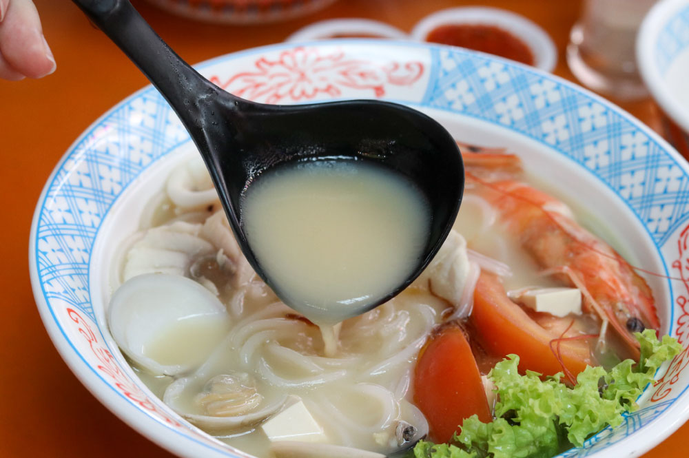 a close up of seafood soup