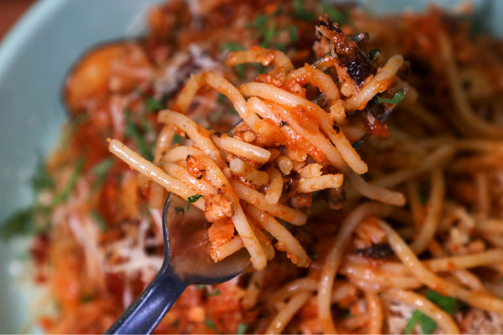 a close up of spaghetti bolognese