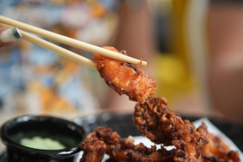 fried squid in chopsticks