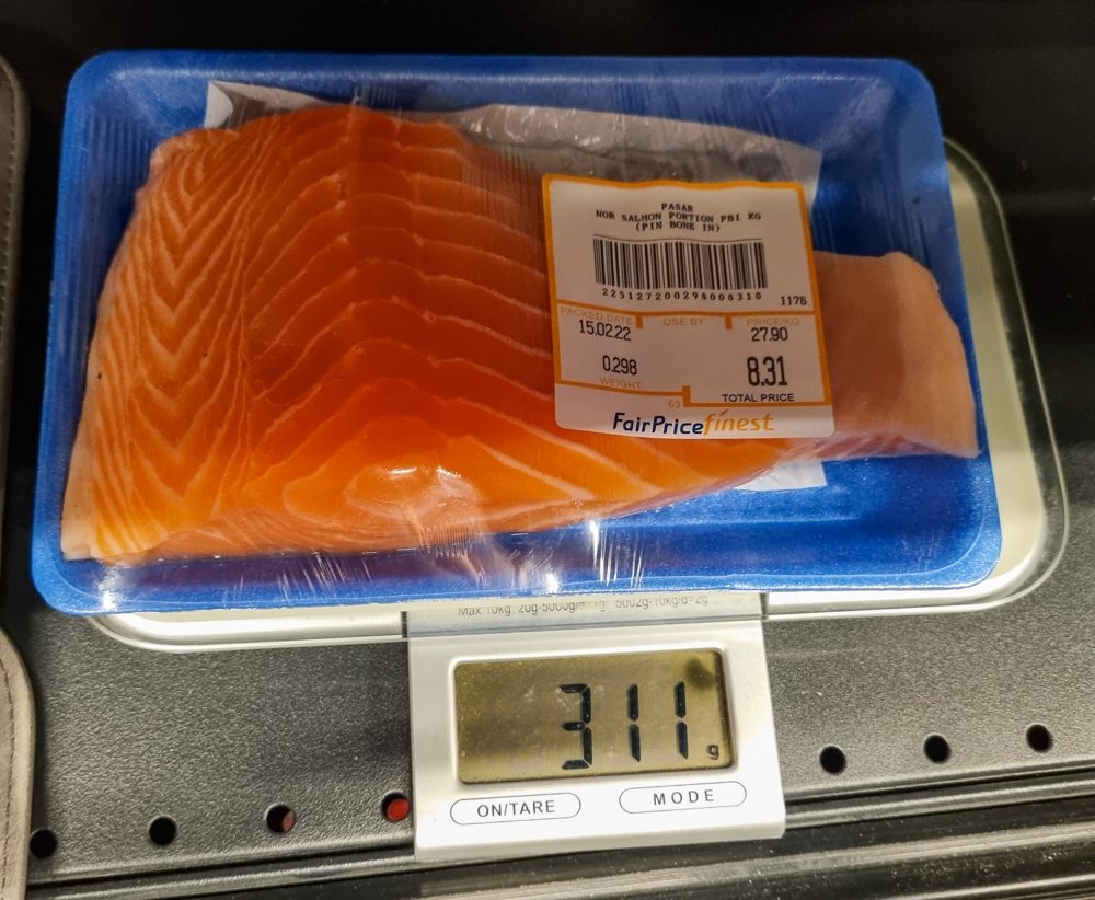 Image of FairPrice salmon on scale