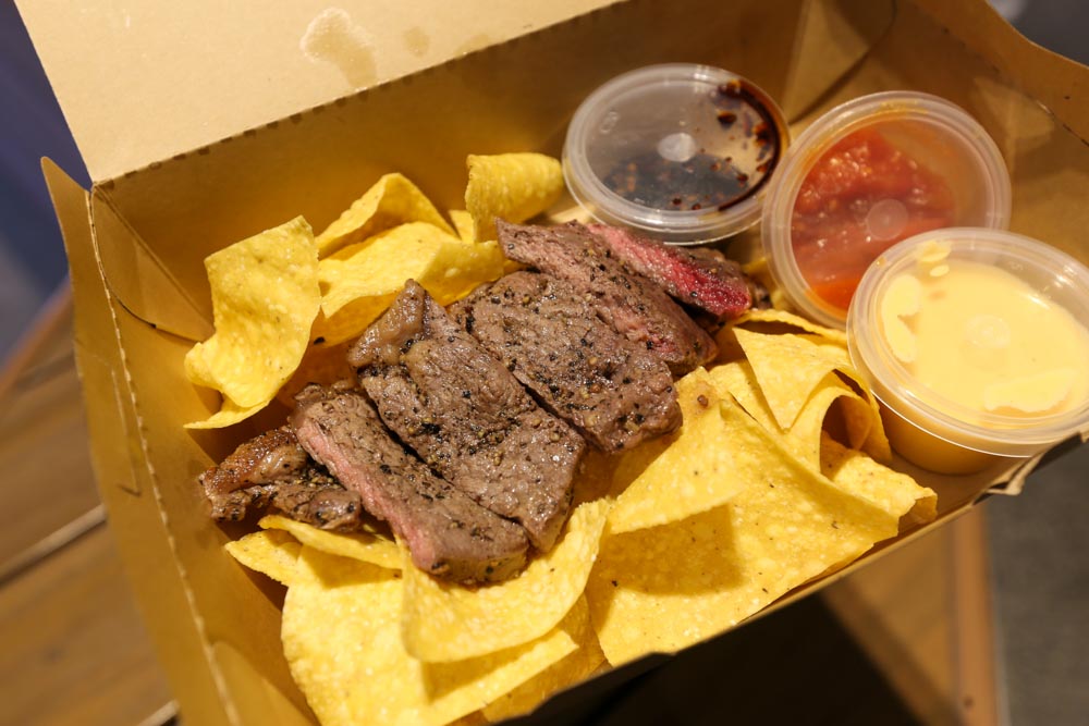 Photo of steak and nachos