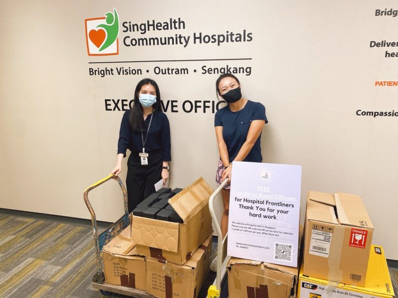 A photo of two Candlescape staff at SingHealth Community Hospital