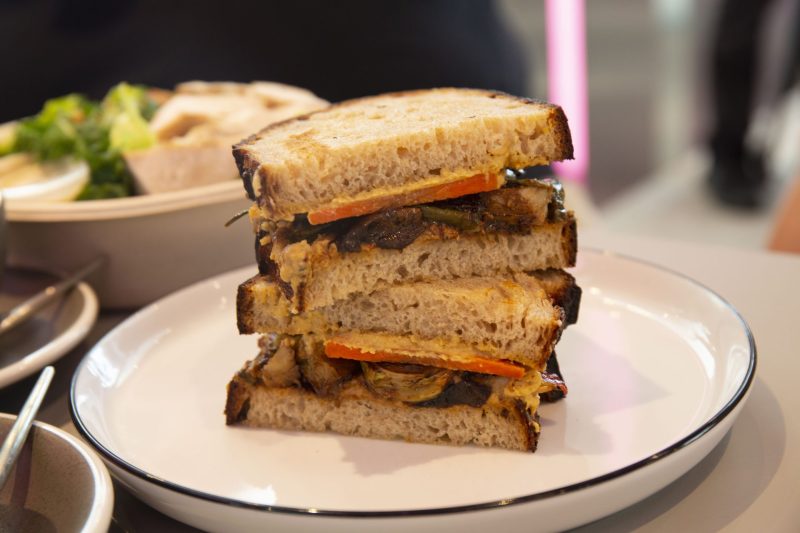 image of roasted veggie and hummus sandwich