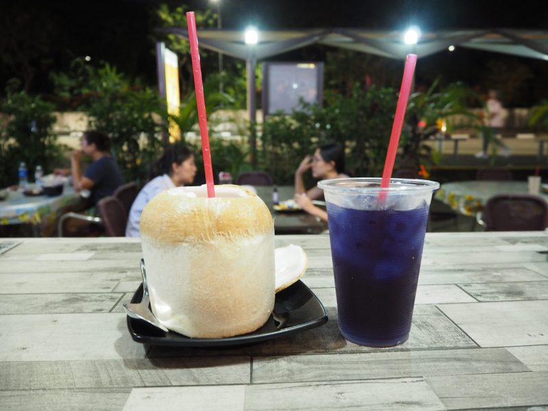 LeWu Cafe – A picture of a young coconut and iced butterfly pea tea