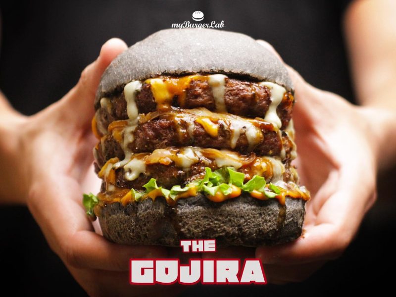 myBurgerLab - holding a burger
