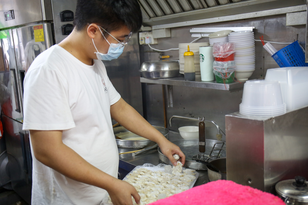 wang's noodle & dumpling house - dumplings being made