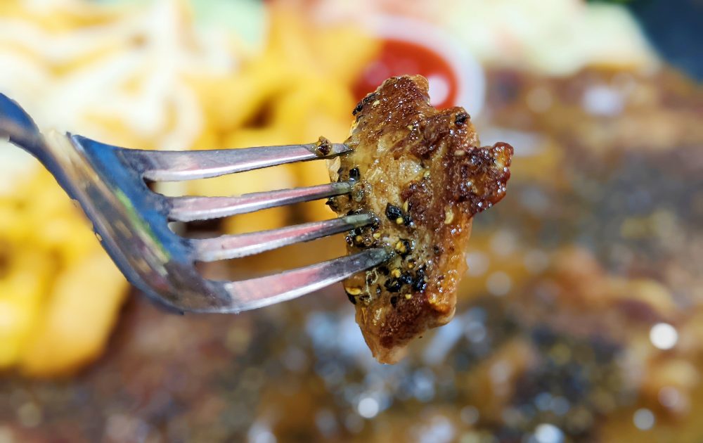Tom's Kitchen - close up of grilled striploin steak