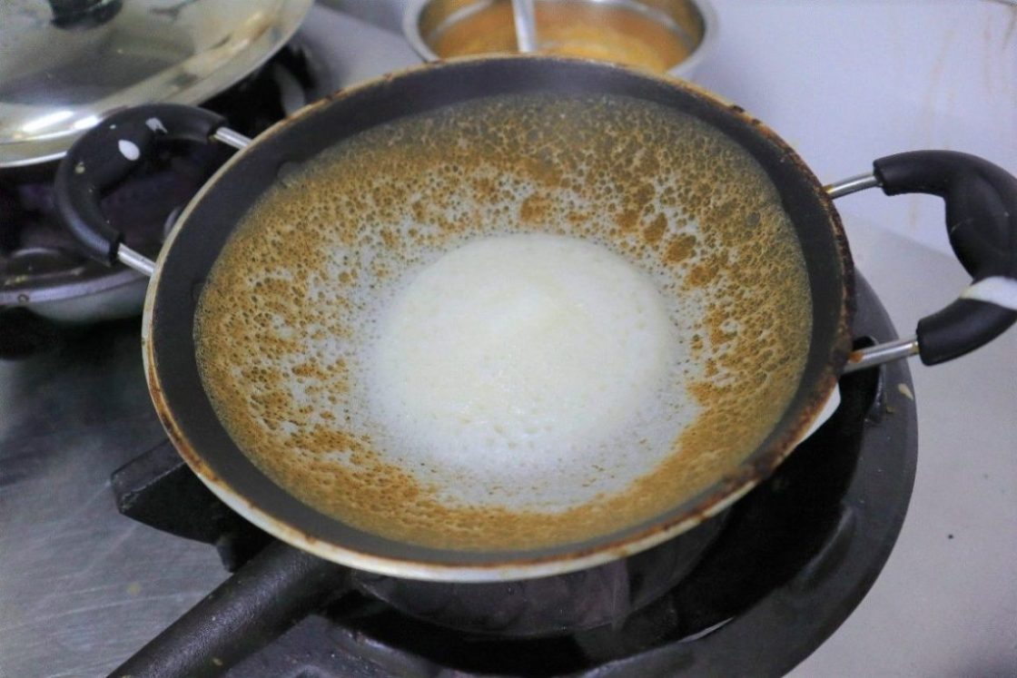 appam aunty - cooking in pan