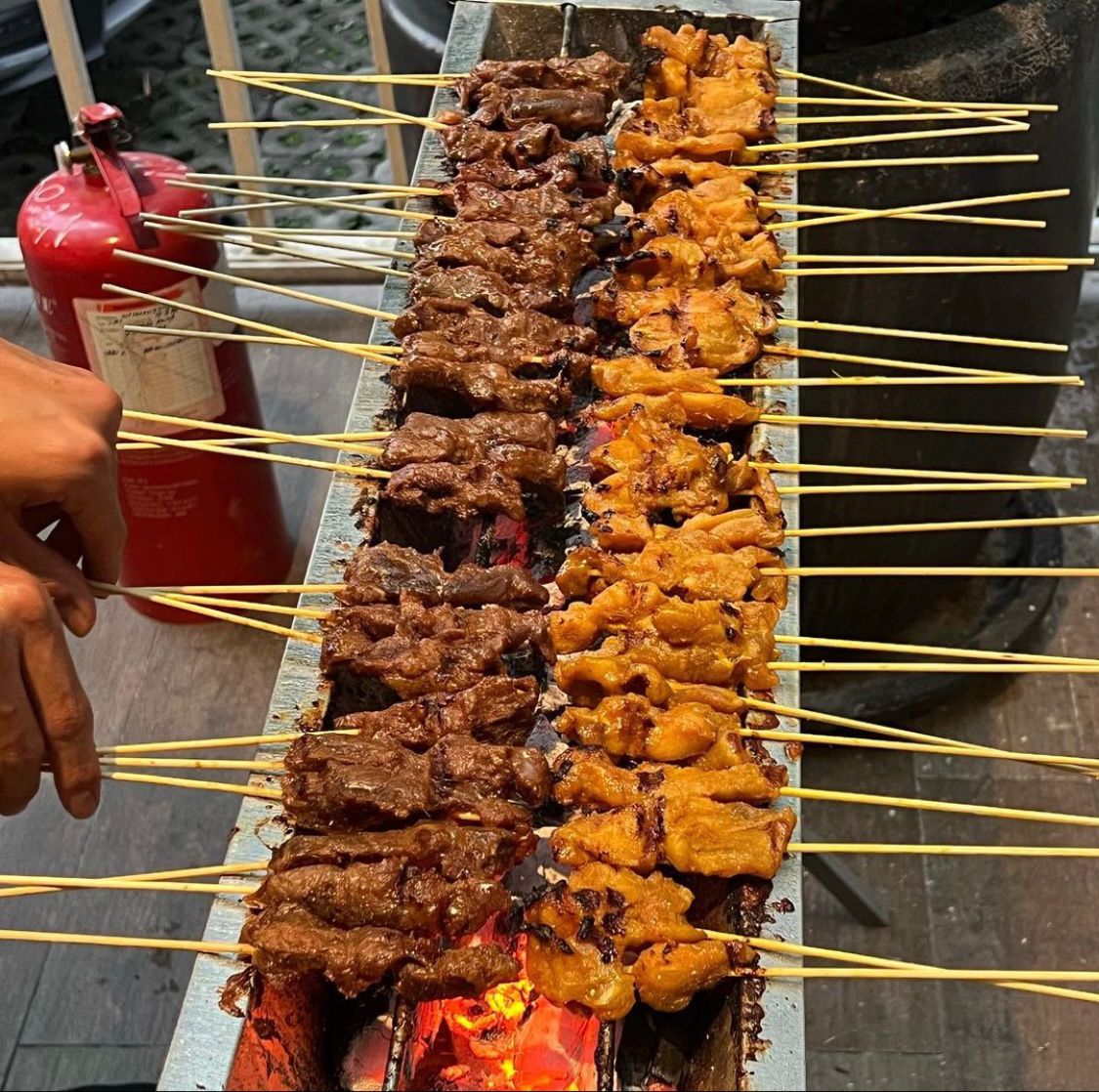 Ramadan - Komune Living - Satay being grilled