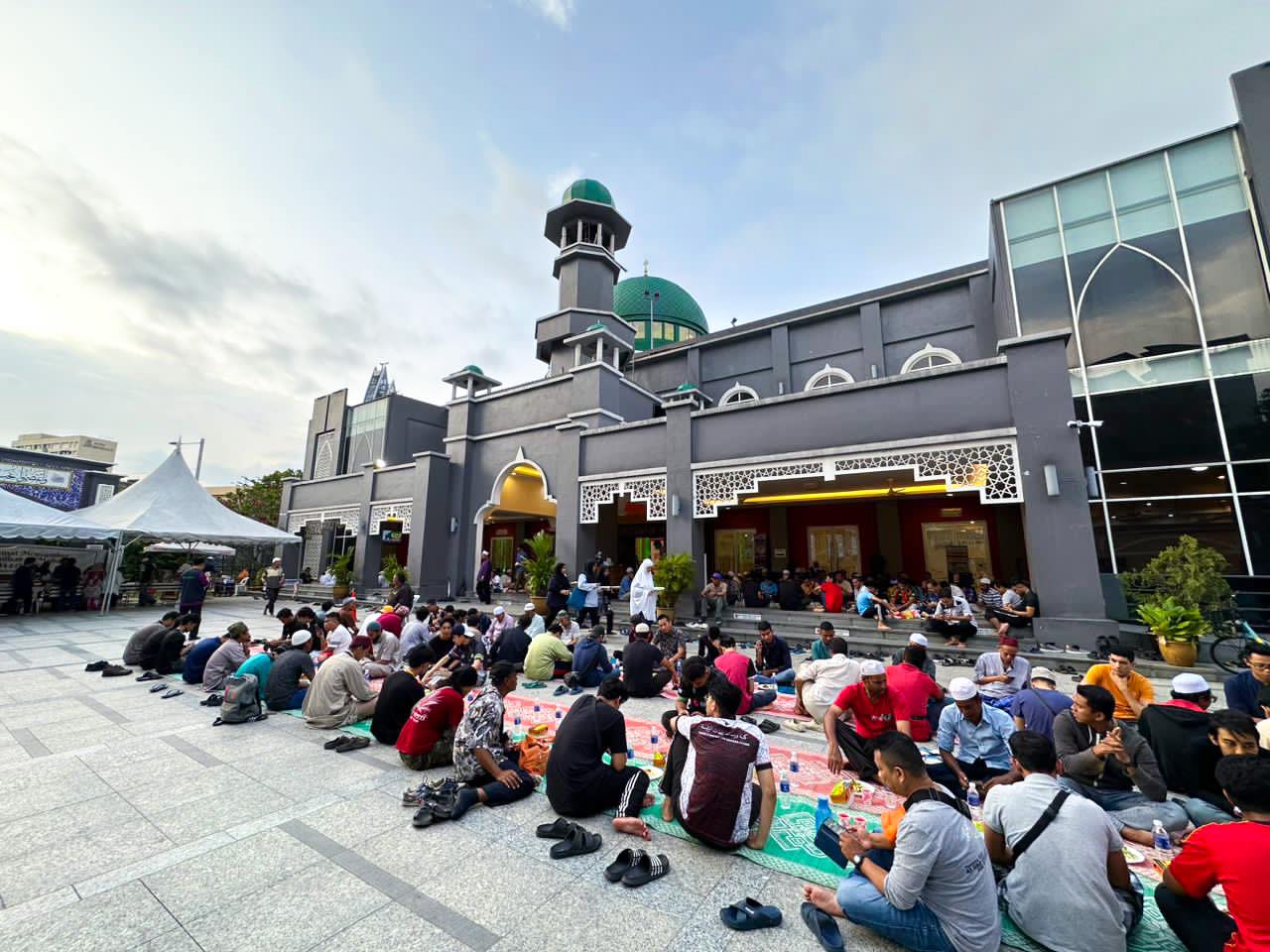 Masjid Jamek Kampung Baru - Mosque goers waiting to break their fast in front of the mosque