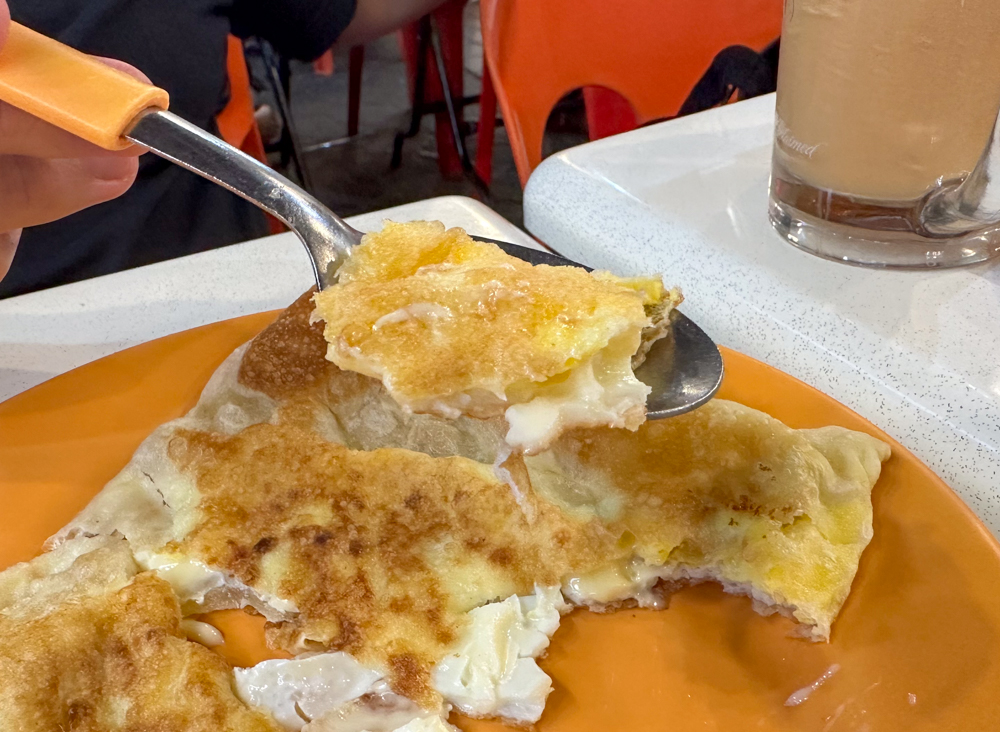 Chindimani Indian Restaurant - egg cheese prata