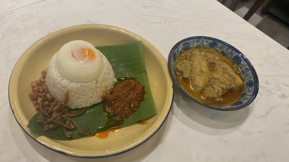 Kopibing - Nasi Lemak Banjir with Poached Egg & chicken rendang