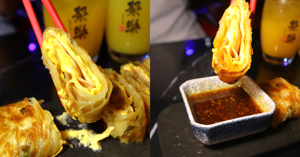 Jyu Lae Bistro - egg roll dipping into sauce