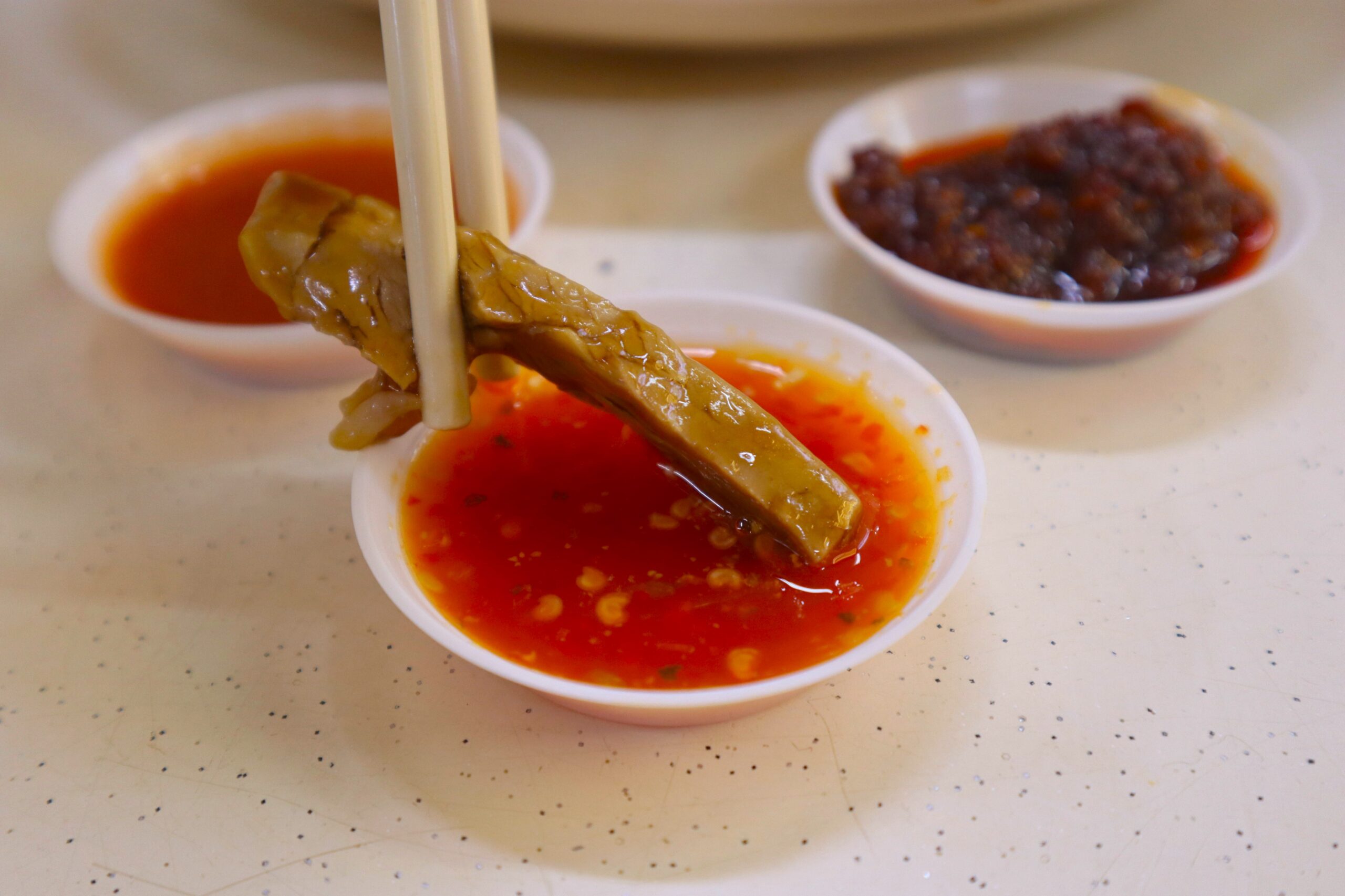 best-rated duck rice - duck dipped in tangy chilli