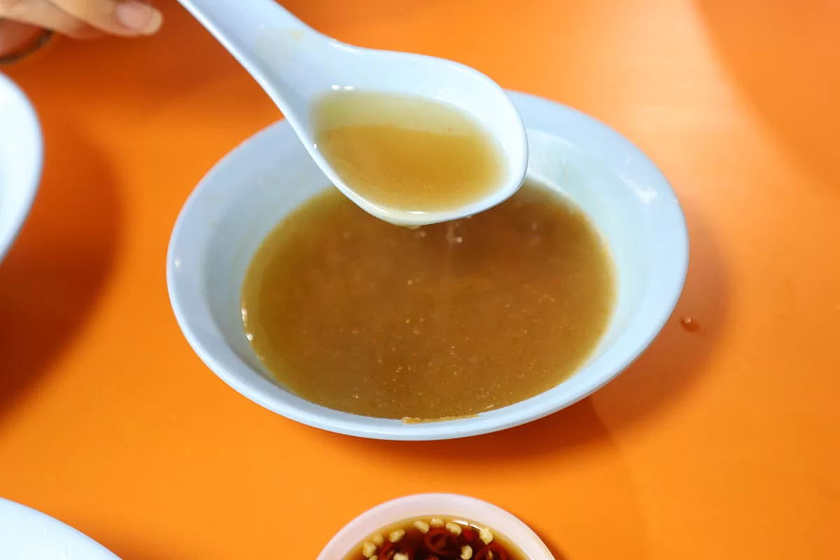 jasmine pork rib prawn noodle - broth upclose