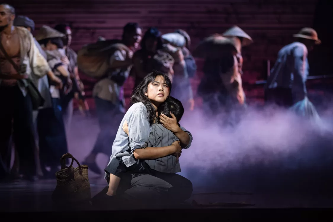 misssaigon - mother hugging son