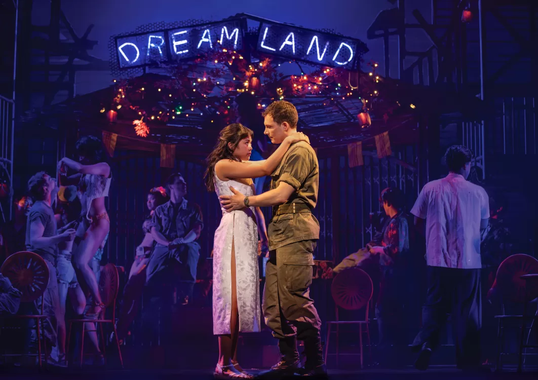 misssaigon - men and woman hugging