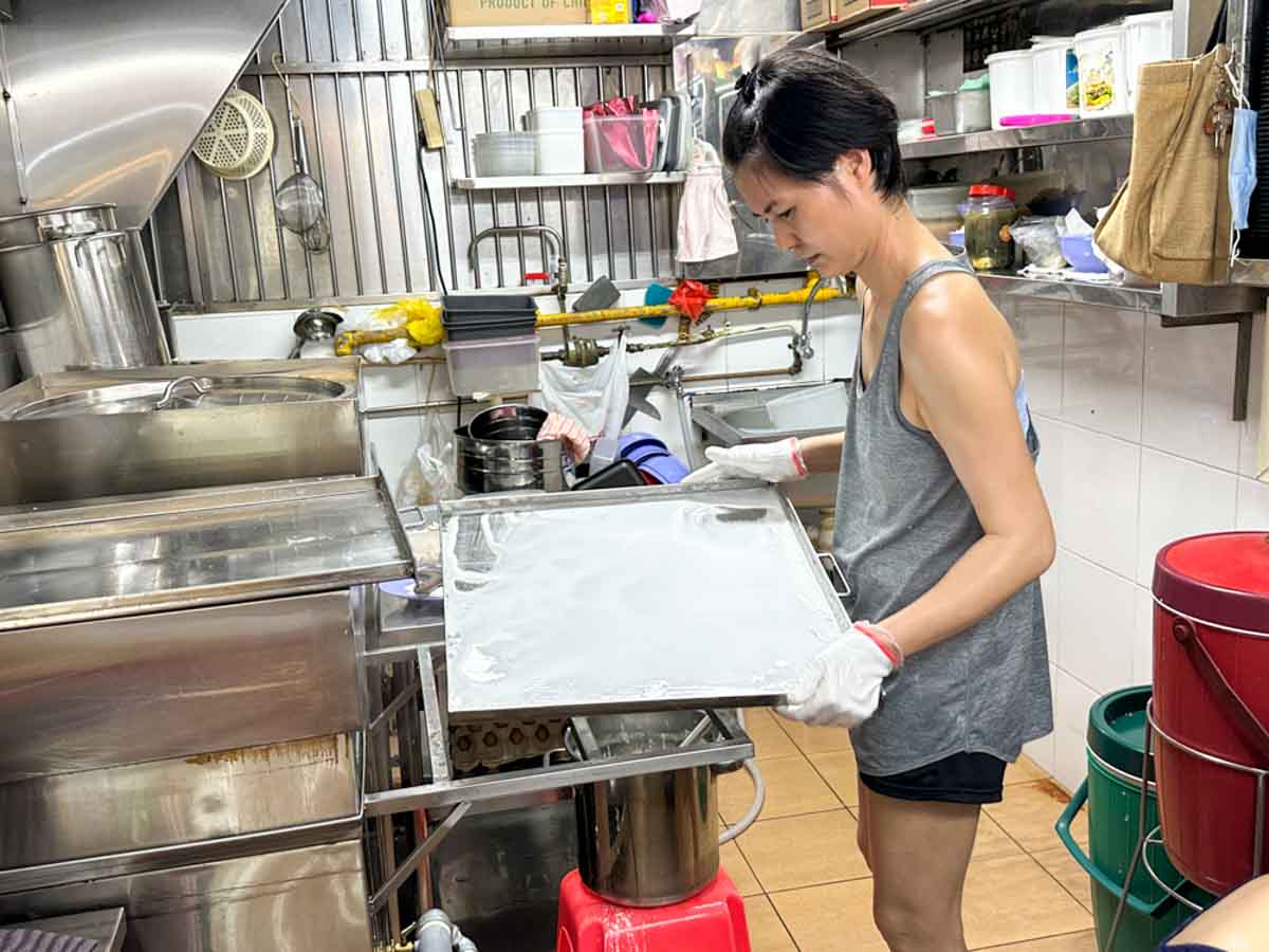 yong huat delights - focused at work