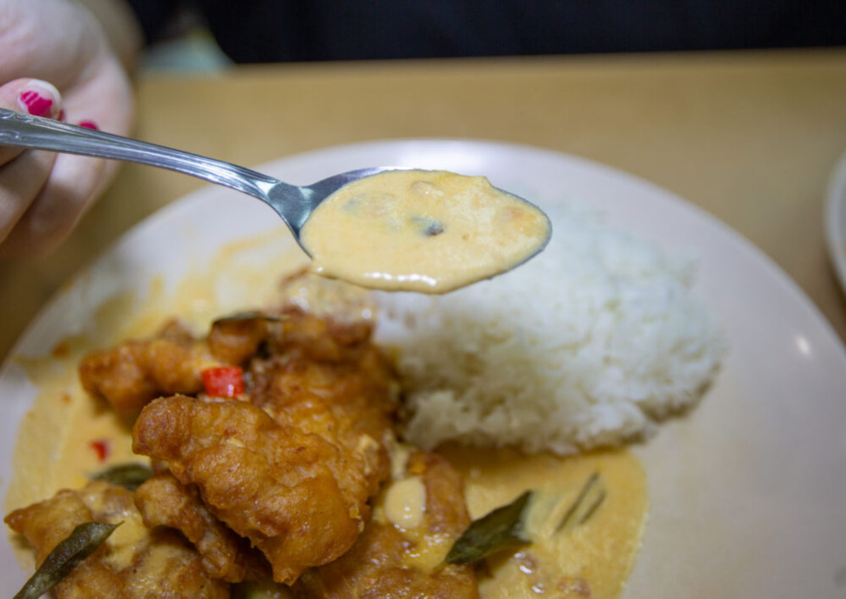 new station snack bar - salted egg pork rice gravy closeup