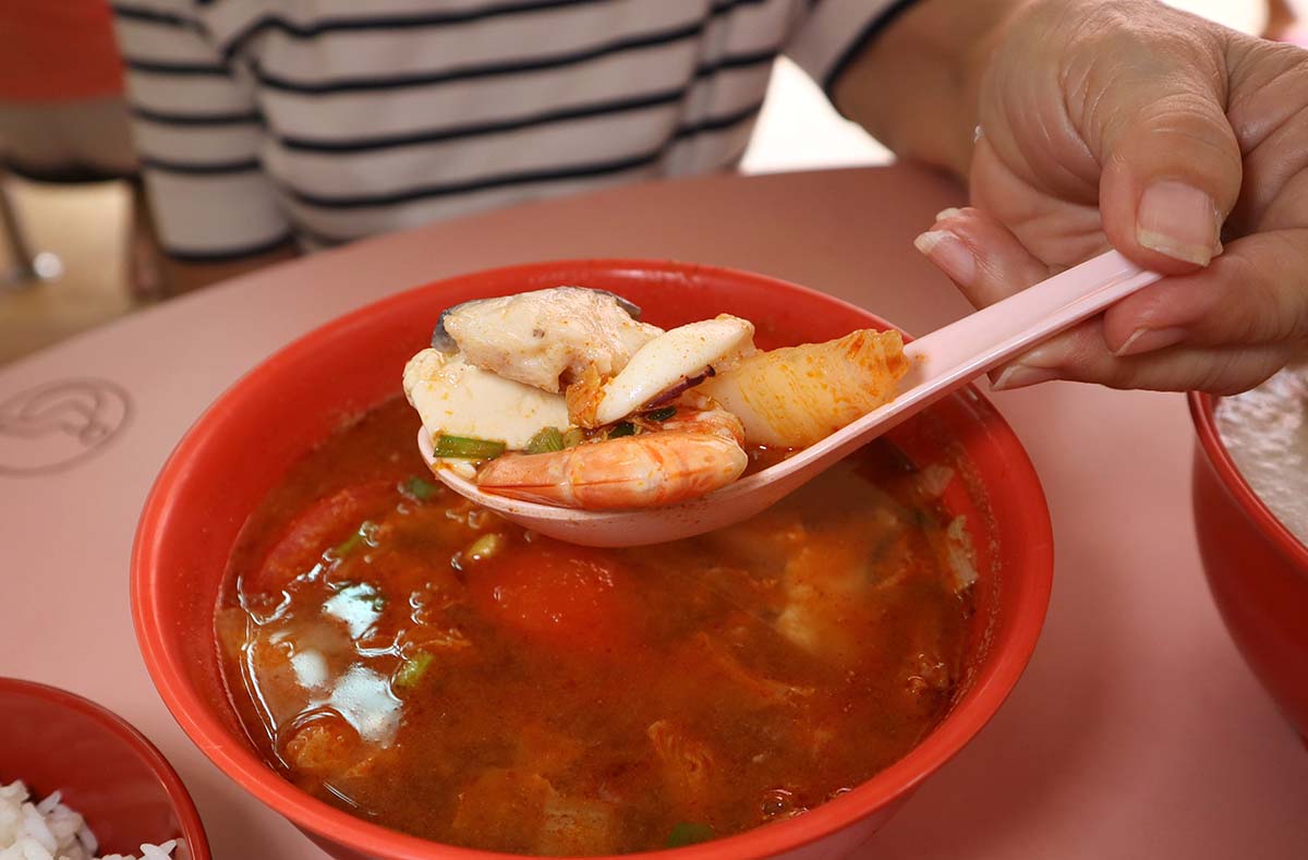 nee soon fish head - tom yum seafood closeup
