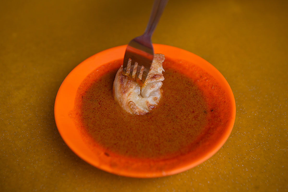 ga-hock roti prata - prata coin w/ fish curry