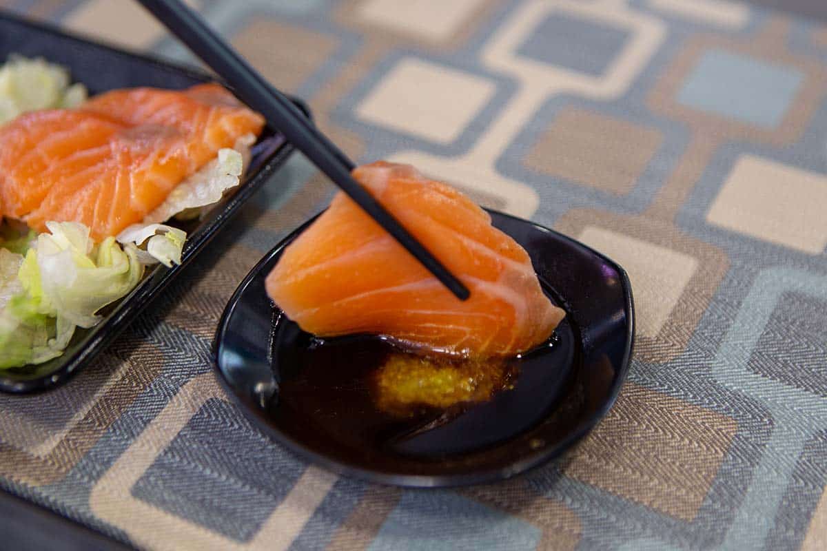 irosho - salmon sashimi dipped in wasabi