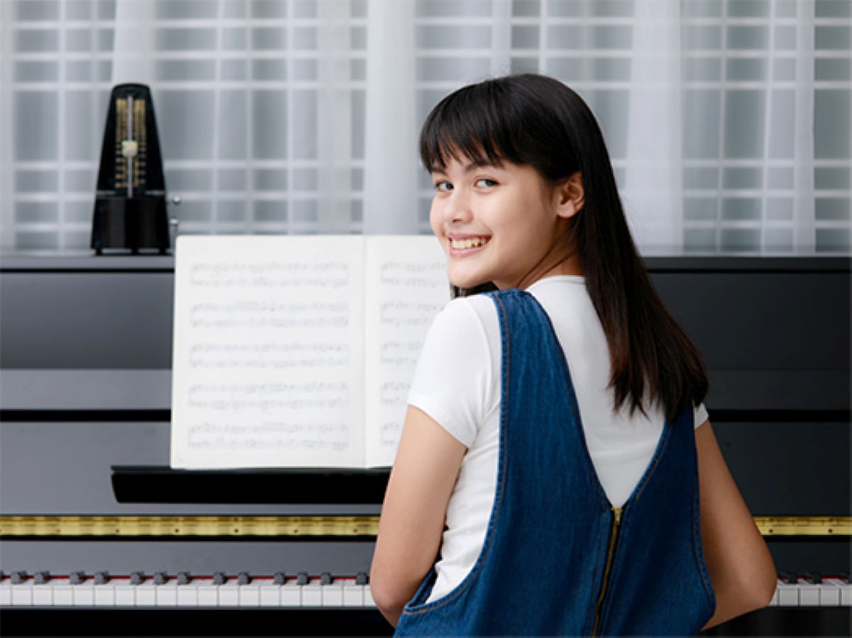 Best Piano Lesson - Woman With Head Turned