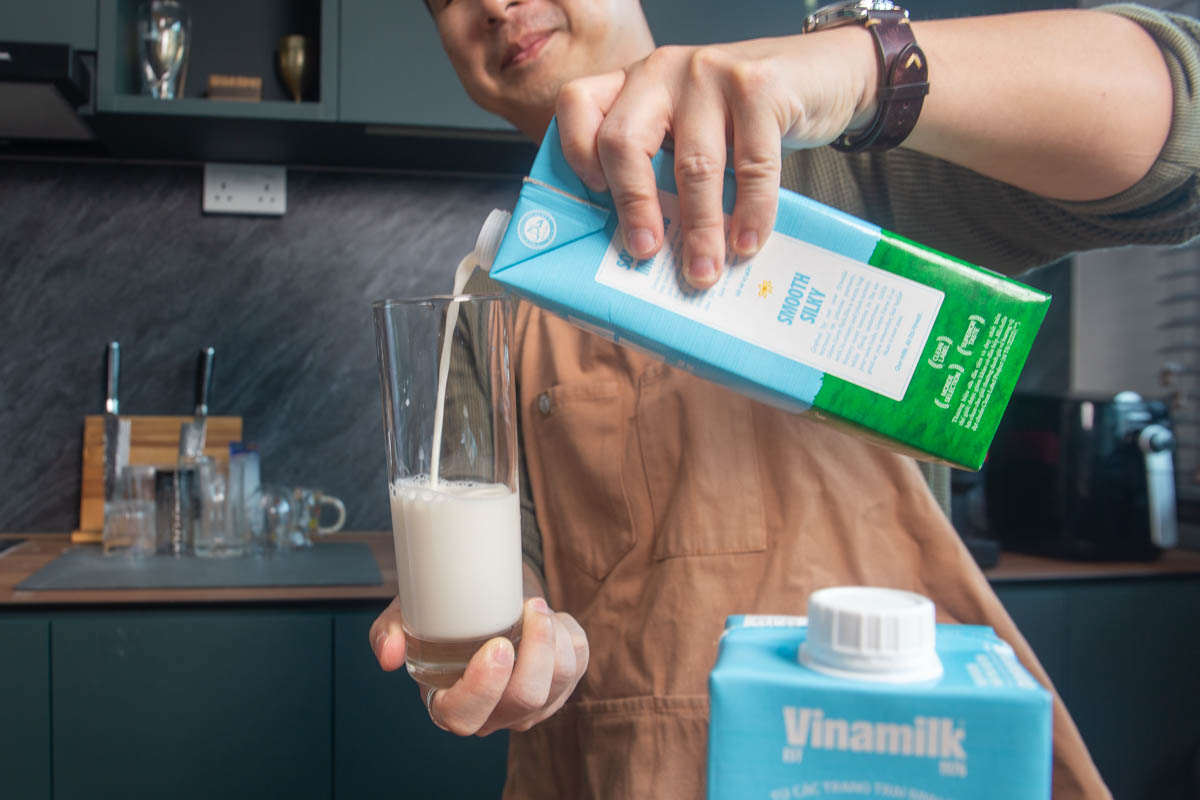 vinamilk - milk pouring shot