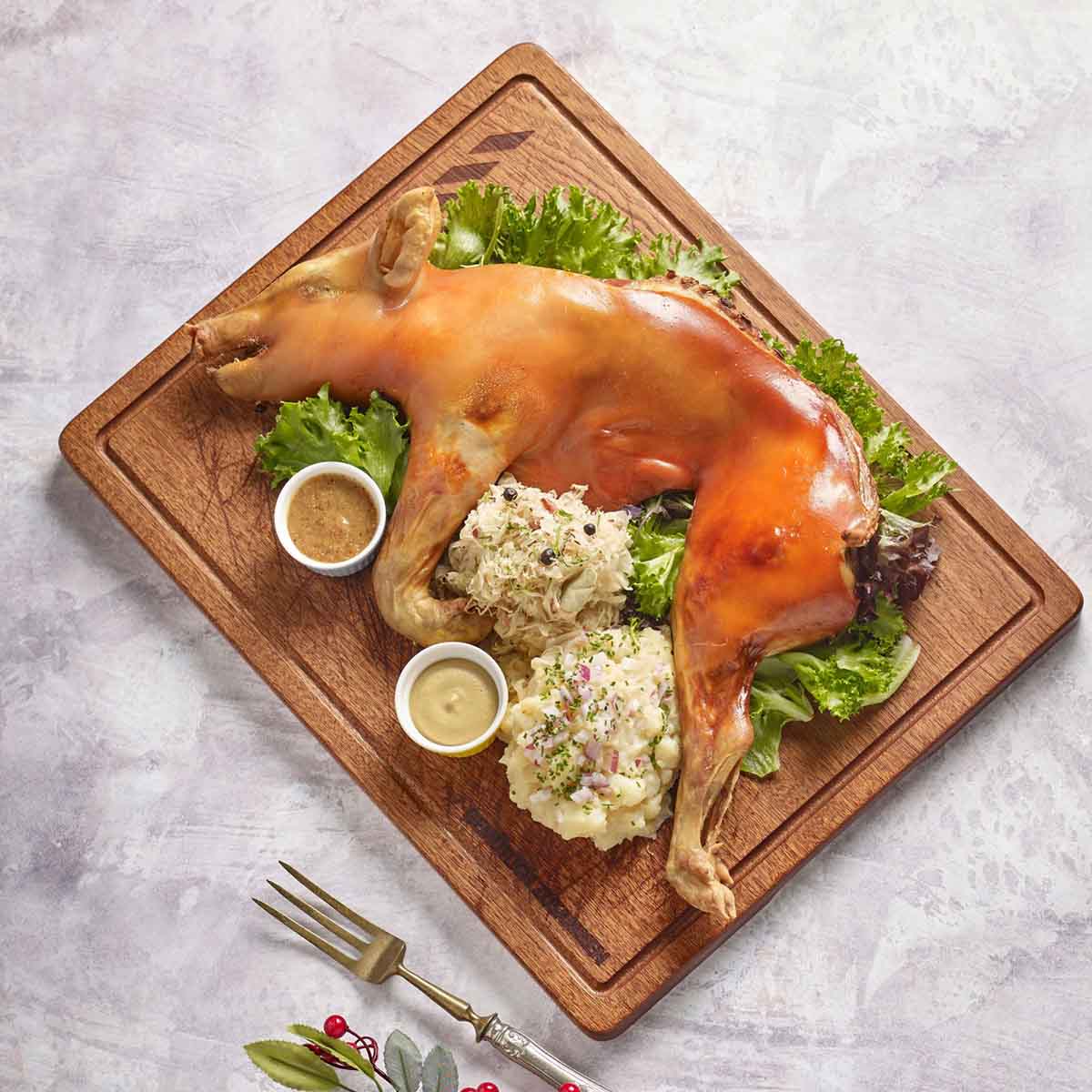christmas restaurants 2025 - brotzeit suckling pig