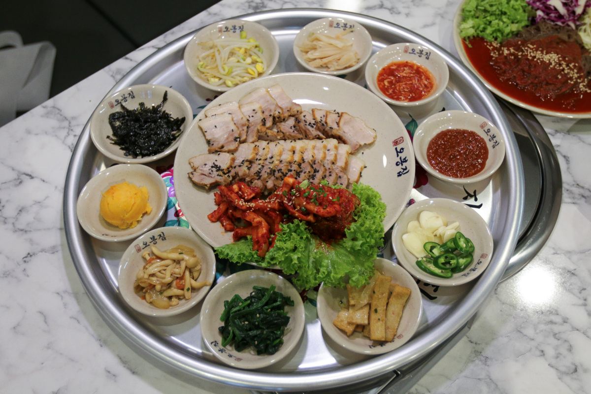 Obongzip opening - pork belly bossam with banchan Obongzip opening - pork belly bossam with banchan