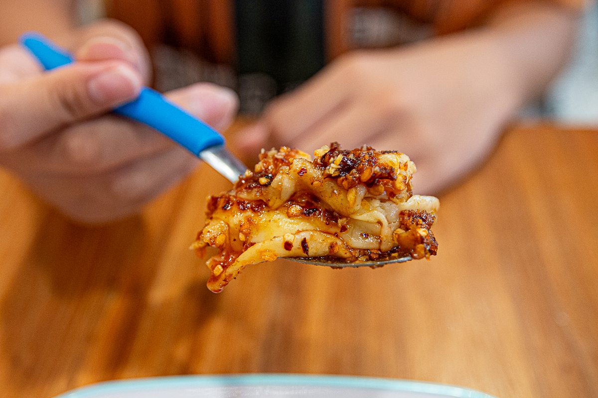 Warung Dimsum - chilli oil dumpling close up Warung Dimsum - chilli oil dumpling close up